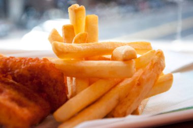 Yakın plan altın çıtır Amerikan patates kızartması.