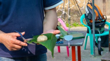 Hand-trimmed plantain leaves of Cao Zai Kueh
