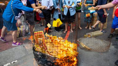 Pudu believers burn paper money during the Chinese Ghost Festival(2018 08 25 Taipei, Taiwan) clipart
