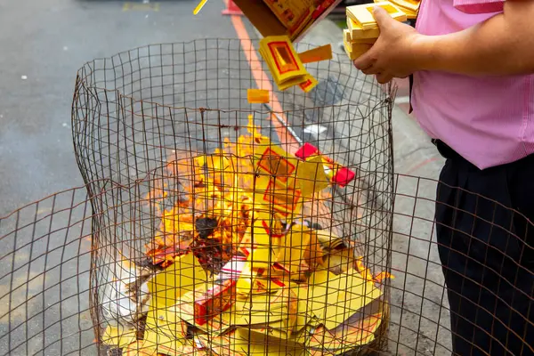 stock image Chinese religious custom Chinese ghost festival close -up believers burned paper money