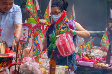 (Text: Qingzan Zhongyuan) Chinese ghost festival Purdue ghosts and gods burn incense and pray for blessings(2018 08 25 Taipei, Taiwan) clipart