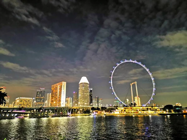 Singapore Flyer with the river in night