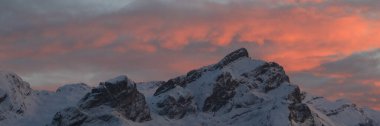 Colorful sky over Mount Schluchhore, Switzerland. clipart