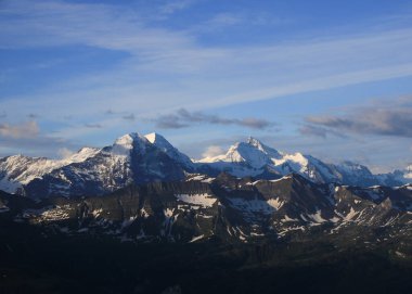 World famous mountain range Eiger, Monch and Jungfrau. View from Mount Brienzer Rothorn. Eiger North Face.