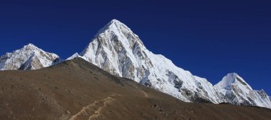 Mount Pumori and Kalapatthar, viewpoint near the Everest Base Camp, Nepal. clipart