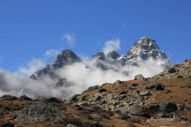 Peaks of Mount Tabuche and Tobuche seen from Dzongla, Nepal. clipart