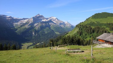 Peak of Mount Oldehore and Glacier 3000 summit station seen from Topfelsberg.