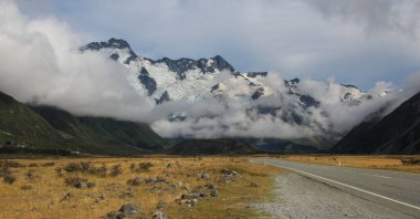 Mount Sefton and The Footstool. High mountains covered by glaciers. New Zealand. clipart