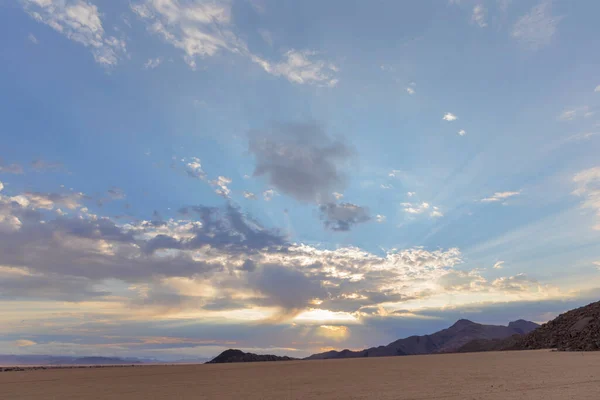 stock image Barren dry desert with some clouds at sunrise Namib Desert Namibia