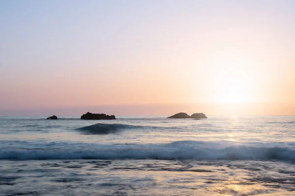 stock image beautiful sunset over the ocean with rocks. west coast of the island of La Palma, Spain. Evening by the sea