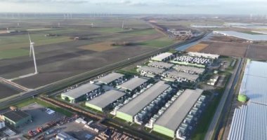 Datacenter building computing and data infrastructure. Aerial drone overhead view.