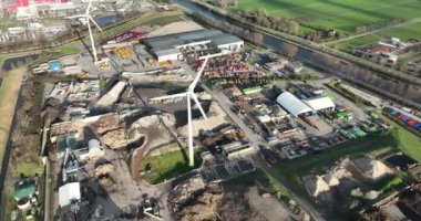 Aerial view of a landfill and recycling rubbish garbage junk, plastic and other materials stored for landfill and recycling.