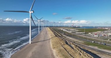 Rotterdam, 19th of January 2023, The Netherlands. Wind turbines on the Maasvlakte large structures generate electricity from wind power, situated on the man-made island of the Port of Rotterdam