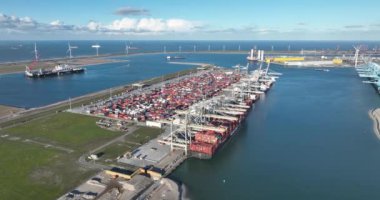 Rotterdam, 19th of January 2023, The Netherlands. RWG is deep-water container terminal on the Maasvlakte, state-of-the-art technology, handling transshipping large volumes of containers. Aerial