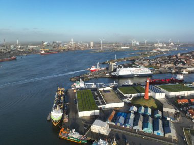 Hoge Vuurtoren in Ijmuiden and Noordzee Kanaal exit in the north sea. Commercial port, fishing industry.