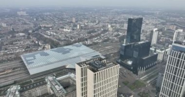Rotterdam, 15th of February 2023, The Netherlands. See Rotterdams bustling transportation hub like never before with an awe-inspiring drone video of the citys central station.