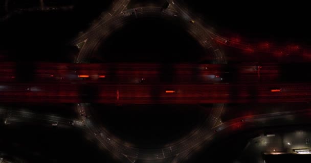 Stunning Drone Video Offers Top View Roundabout Traffic Swirling Dark — Stockvideo