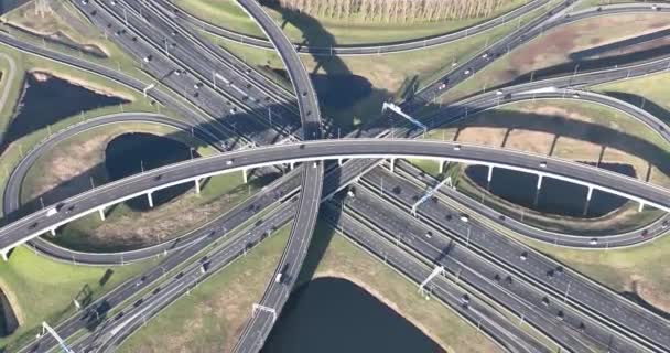 Breathtaking Drone Footage Showcases Complex Design Engineering Multilevel Highway Intersection — стоковое видео