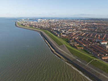 Watch as the drone soars over the picturesque coastal town of Den Helder, capturing its beauty from a unique perspective.