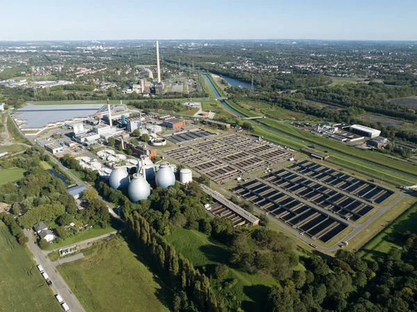 Aerial drone view of Water cleaning facility in Germany, wastewater treatment, Water treatment, drinking water, water supply. Top down view.