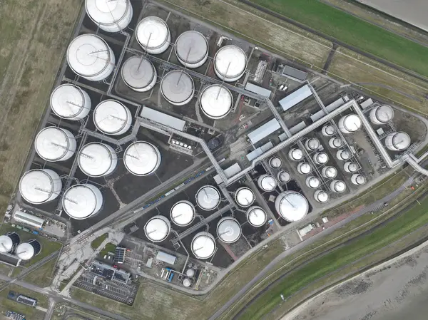 Top down aerial drone view on Bulk energy and chemical product storage in large terminals.