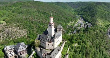 Aerial birds eye view on a medieval castle on a mountain. Marksburg castle.