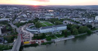 Electoral Palace, Koblenz, Germany along the rhine river at sunset. Aerial birds eye view.