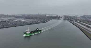 Aerial view of the entrance towards the Zeebrugge sea terminal, ship passing through. Belgium.
