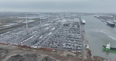 Zeebrugge, West Flanders, Belgium, 10th of March, 2024: Aerial drone view on the Seaport of Bruges. Roll on Roll off terminal. car transportation terminal.