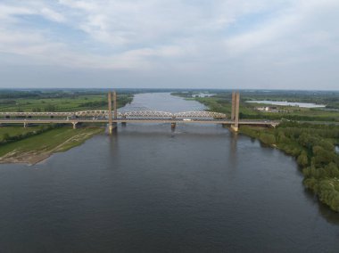 Martinus Nijhoffbrug, a Dutch infrastructure rail and road bridge. Aerial view. clipart