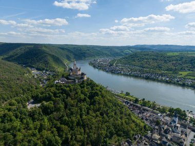 Aerial drone view on the Marksburg castle in Braubach under Koblenz in Germany along the rhine river. Birds eye view. clipart