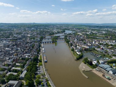 Aerial drone view of the deutsche Eck, monument in the city of Koblenz, Germany at sunset. Birds eye view.