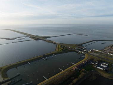 Kornwerderzand, Afsluitdijk, The Netherlands, sluices on the side of Friesland, infrastructure, water barrier. dutch icon. Aerial view. clipart