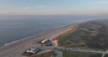 Texel, ada, kum tepeleri, kum, gün batımı bir hava aracı kumsalı videosu