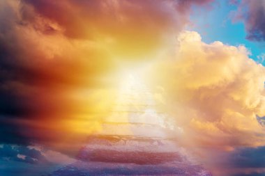 Beautiful religious background.Sunset or sunrise with clouds,blurred stairs to heaven,sunlight from heaven,stairway leading up to skies clouds.Light from sky.Religion concept.Blurred soft focus. clipart