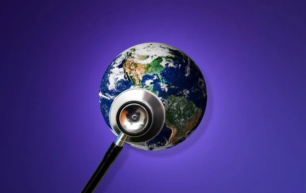 Globe health and stethoscope diagnose on blue background.Concept for global medicine.Isolated on blue.Elements of this image furnished by NASA.