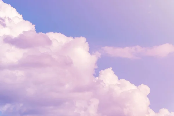 Purple and Pink Sky and clouds with abstract colored background.Toned.