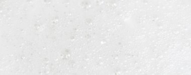 Pankart, reklam. Sabun köpükleri. Soyut arka plan beyaz sabunlu köpük. Şampuan köpüğü..