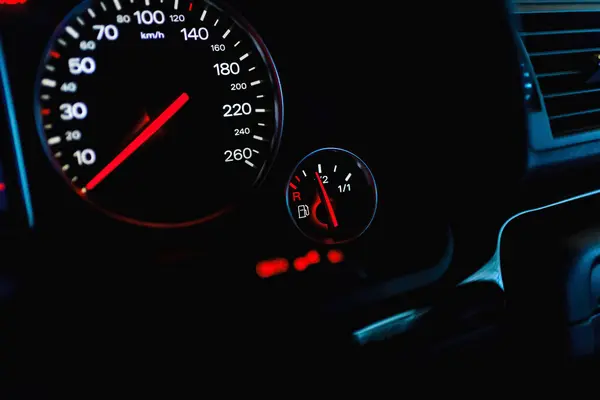 Car\'s dashboard.Modern car dashboard panel at night time.Closeup,selective focus.