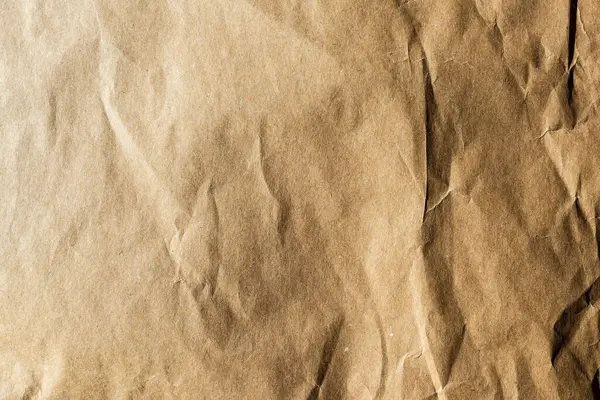 Boş kahverengi buruşmuş kağıt dokusu arka planı, el işi tasarımı için eski sayfa.