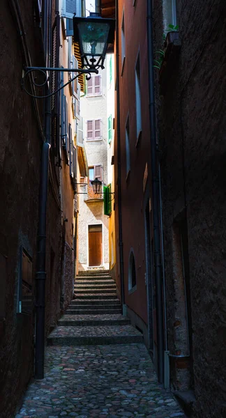 stock image Beautiful old narrow street in Morcote, one of the most picturesque villages in Switzerland, located on the shore of Lake Como.