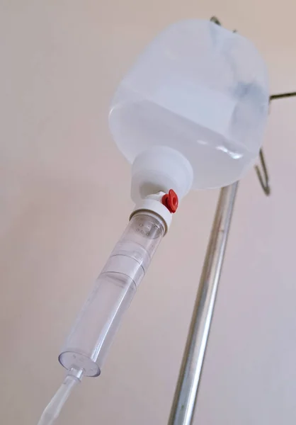 Closeup set iv fluid intravenous drop saline drip hospital, Medical Concept. Infusion bottle with IV solution.