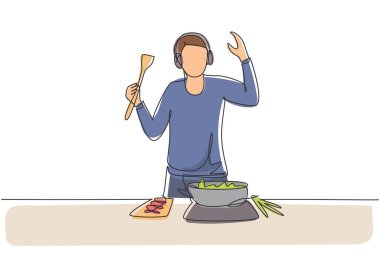 Single one line drawing young man cooking and listening to music in kitchen. Healthy food illustration. Healthy lifestyle concept. Cooking at home. Prepare food. Continuous line draw design graphic