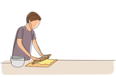 Single continuous line drawing young man making cookie dough using rolling pin at cozy kitchen table. Making bakery and homemade pizza at home. Dynamic one line draw graphic design vector illustration
