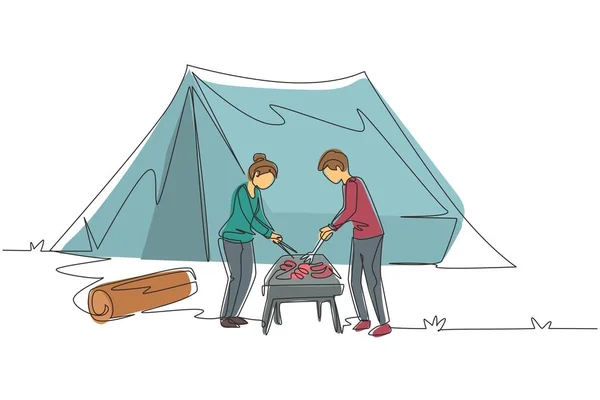 Single one line drawing happy couple are having barbecue in the mountain. Man woman camping in forest, active recreation, romantic date out of town. Continuous line draw design vector illustration