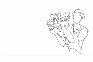 Omzunda rattan sepet taşıyan bir erkek çiftçi çiziyor. Sebze hasadı. Bereketli tarım arazisi. Ulusal Tarım Günü. Devamlı çizgi tasarımı grafik çizimi