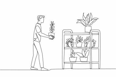 Tek çizgi çizen adam, çömleği kaldırıyor ve saksı dolusu bitkinin üzerine koymak istiyor. Seçimden sonra bitkileri ayırma süreci. Ulusal Bahçıvanlık Günü. Devamlı çizgi tasarımı grafik çizimi