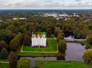 Drone aerial view of the beautiful white castle of Ahrensburg. High quality photo clipart