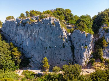 Drone aerial view of the climbing walls of Muzzerone near Portovenere. High quality photo clipart