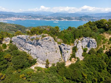 Drone aerial view of the climbing walls of Muzzerone near Portovenere. High quality photo clipart